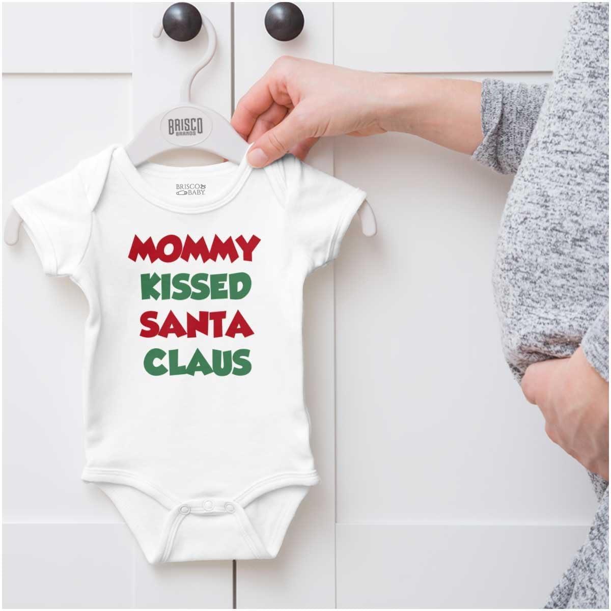 imageBrisco Brands Christmas Mommy Kissed Santa Claus Baby Romper Boys or GirlsWhite