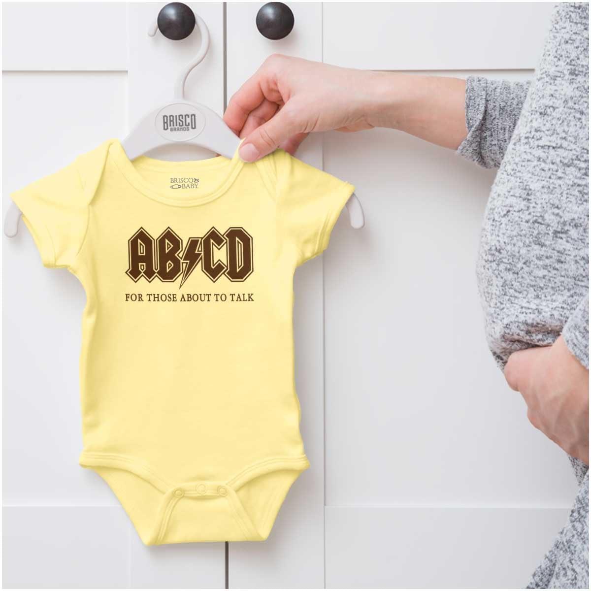 imageBrisco Brands Cutest Lil Rockstar Music Lover ABCD Baby Romper Boys or GirlsAbcd Banana