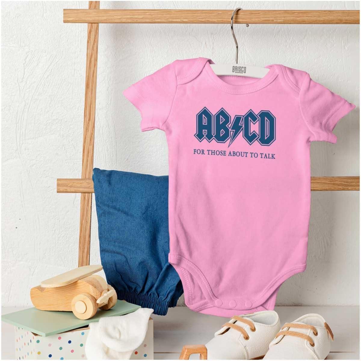 imageBrisco Brands Cutest Lil Rockstar Music Lover ABCD Baby Romper Boys or GirlsAbcd Pink