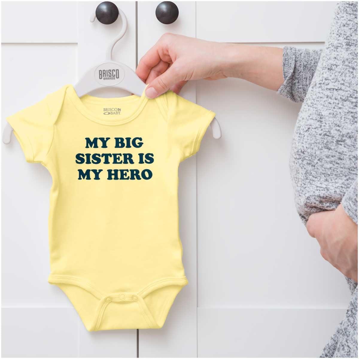 imageBrisco Brands My Big Sister My Hero Little Sis Love Baby Romper Boys or GirlsBanana