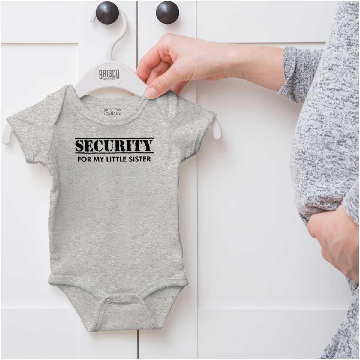 imageBrisco Brands Security Little Sibling Lil Sis Family Baby Romper Boys or GirlsHeather