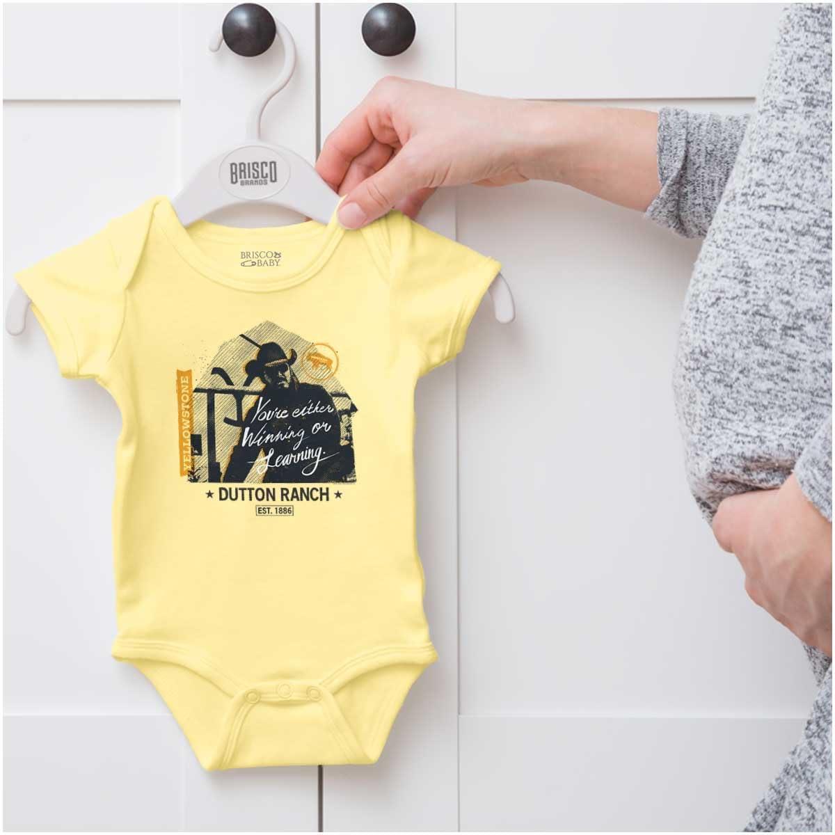 imageBrisco Brands Yellowstone Cowboy Winning or Losing Baby Romper Boys or GirlsBanana