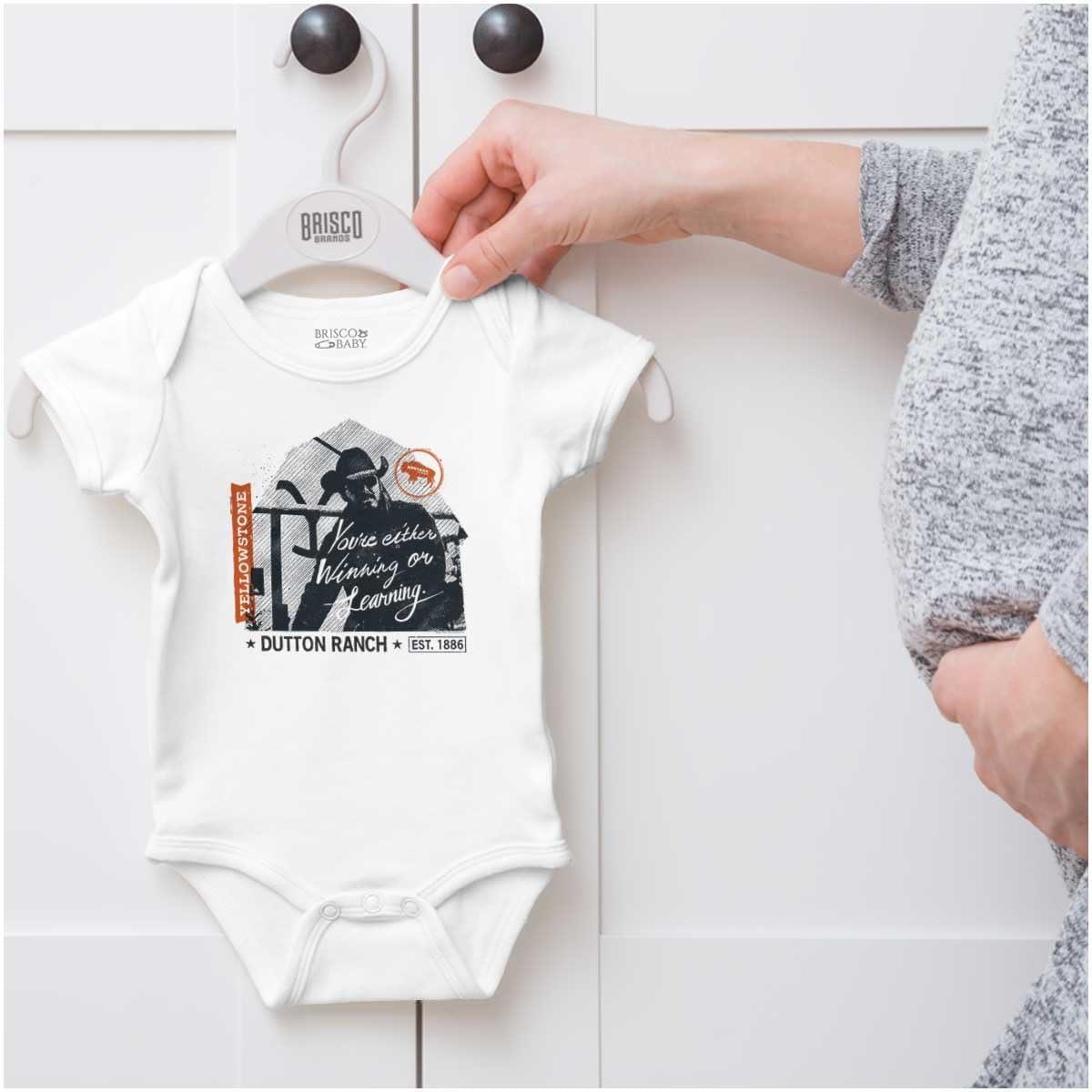 imageBrisco Brands Yellowstone Cowboy Winning or Losing Baby Romper Boys or GirlsWhite