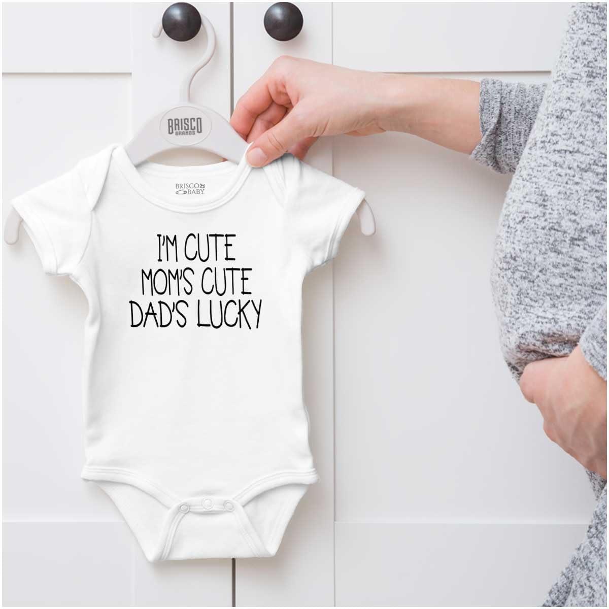 imageBrisco Brands Funny Im Cute Moms Cute Dads Lucky Baby Bodysuit Jumper GirlsWhite