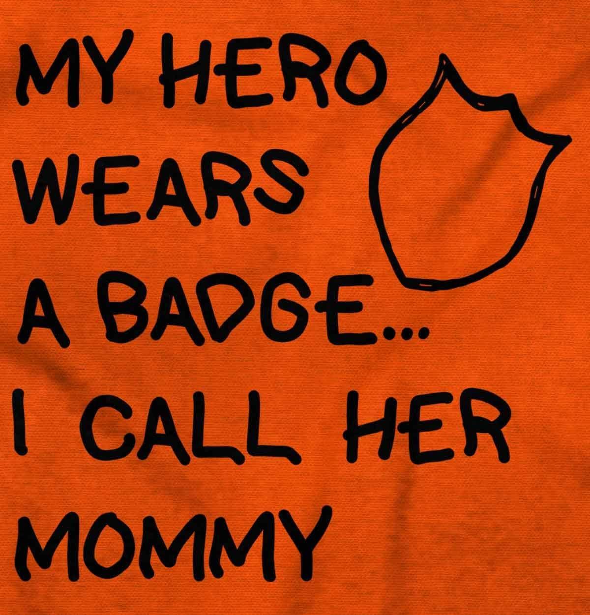 imageBrisco Brands My Hero Wears Badge I Call Her Mommy Baby Romper Boys or GirlsOrange