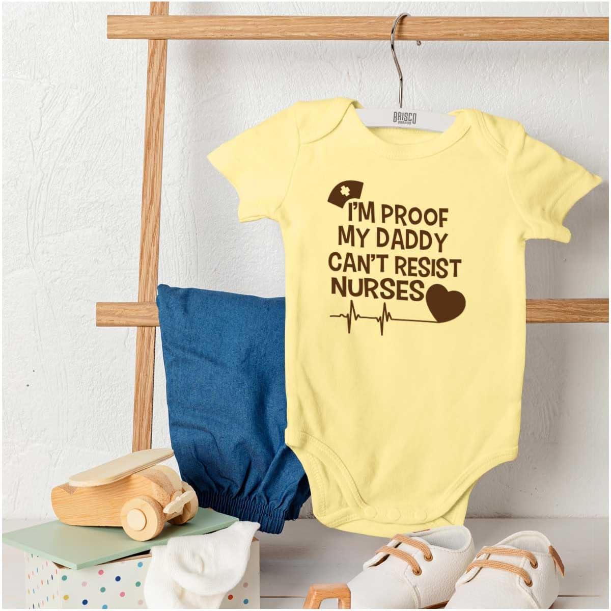 imageBrisco Brands Proof Daddy Cant Resist Nurses Heart Baby Romper Boys or GirlsBanana