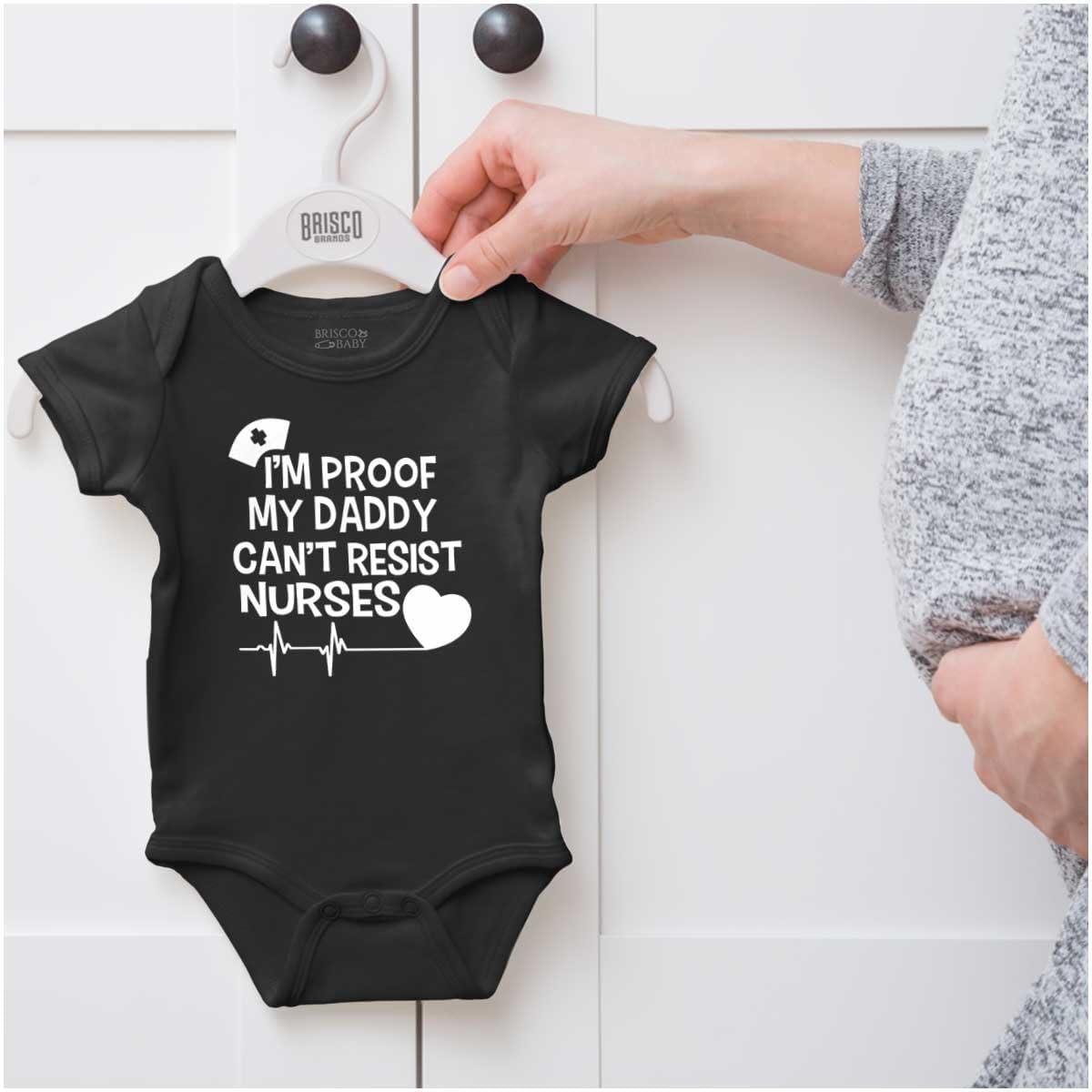 imageBrisco Brands Proof Daddy Cant Resist Nurses Heart Baby Romper Boys or GirlsBlack