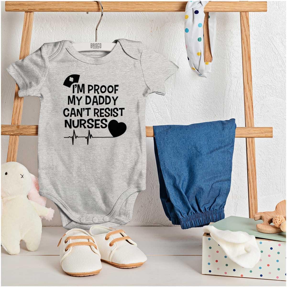 imageBrisco Brands Proof Daddy Cant Resist Nurses Heart Baby Romper Boys or GirlsHeather