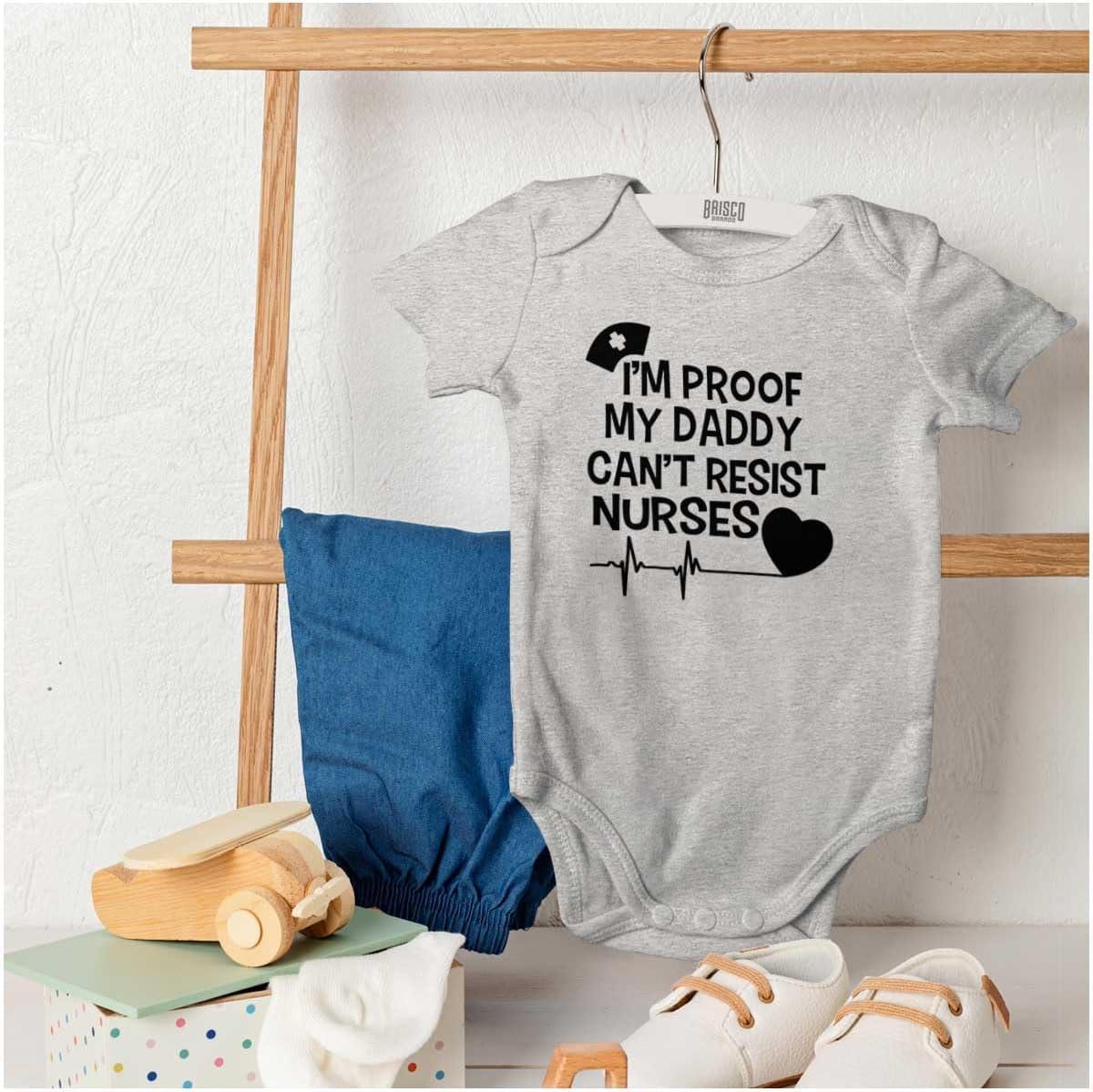 imageBrisco Brands Proof Daddy Cant Resist Nurses Heart Baby Romper Boys or GirlsHeather