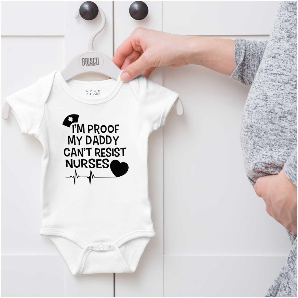 imageBrisco Brands Proof Daddy Cant Resist Nurses Heart Baby Romper Boys or GirlsWhite