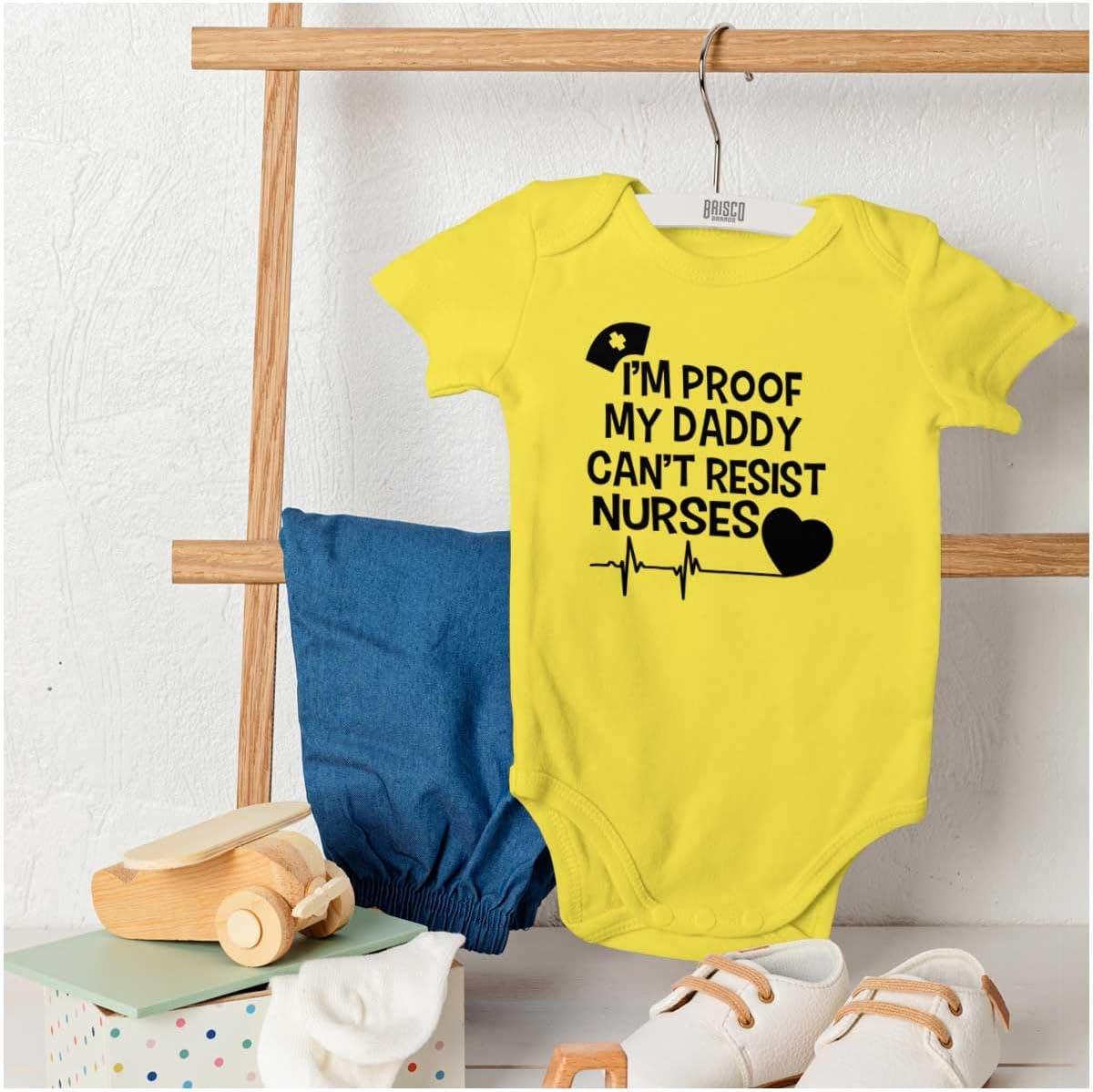 imageBrisco Brands Proof Daddy Cant Resist Nurses Heart Baby Romper Boys or GirlsZest