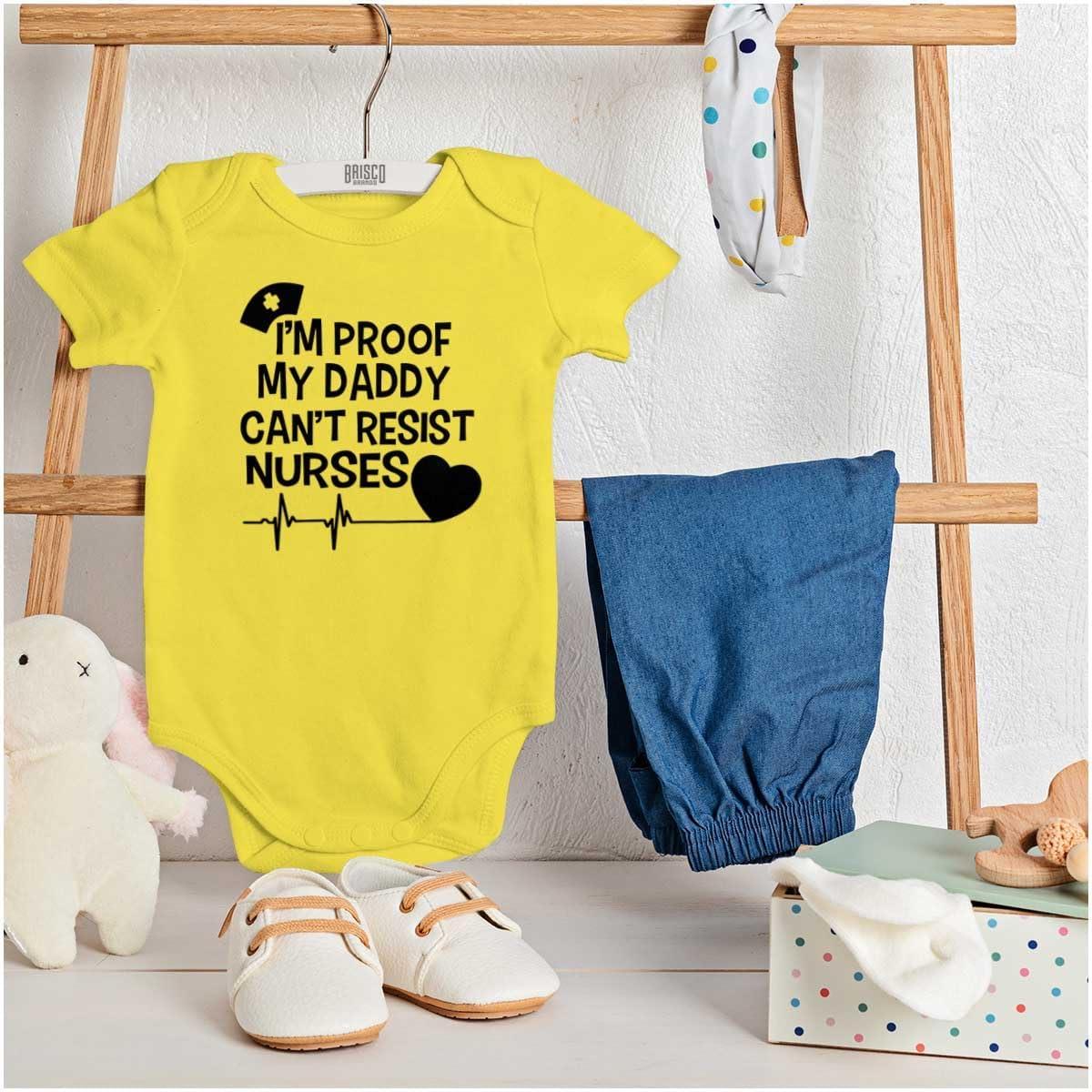 imageBrisco Brands Proof Daddy Cant Resist Nurses Heart Baby Romper Boys or GirlsZest