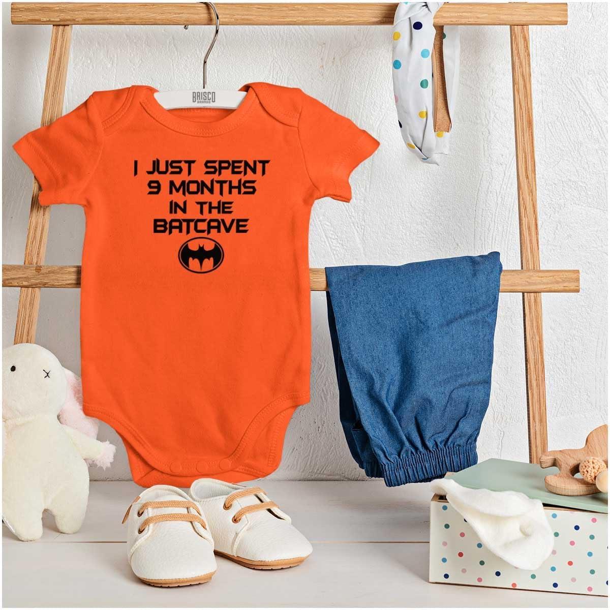 imageBrisco Brands Spent 9 Months in the Cave Superhero Baby Romper Boys or GirlsOrange