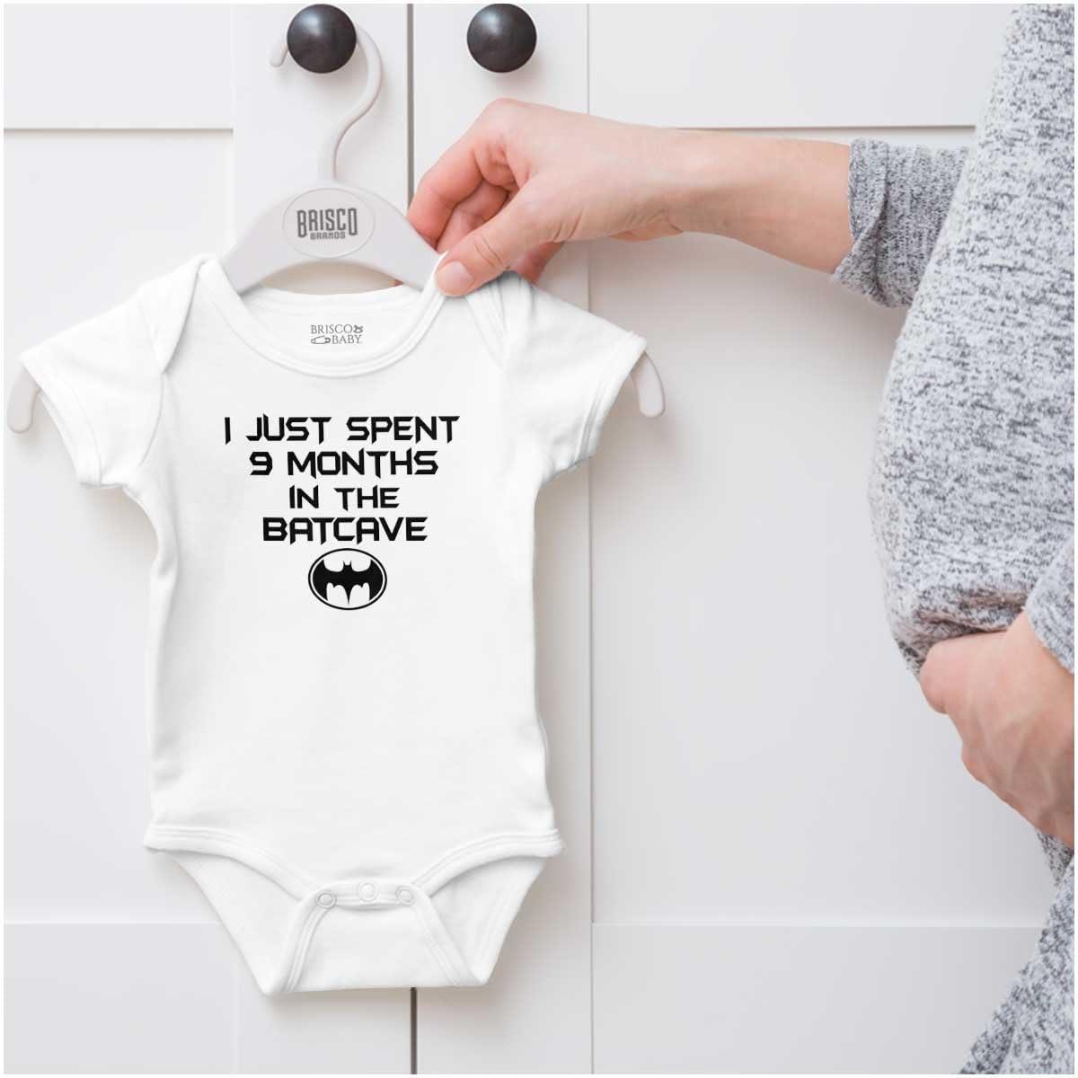 imageBrisco Brands Spent 9 Months in the Cave Superhero Baby Romper Boys or GirlsWhite