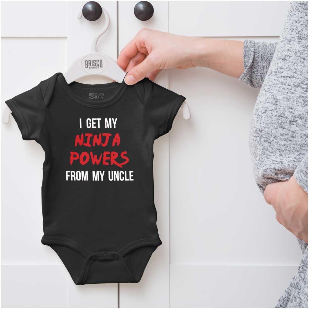 imageBrisco Brands Get My Ninja Powers From My Uncle Baby Romper Boys or GirlsBlack