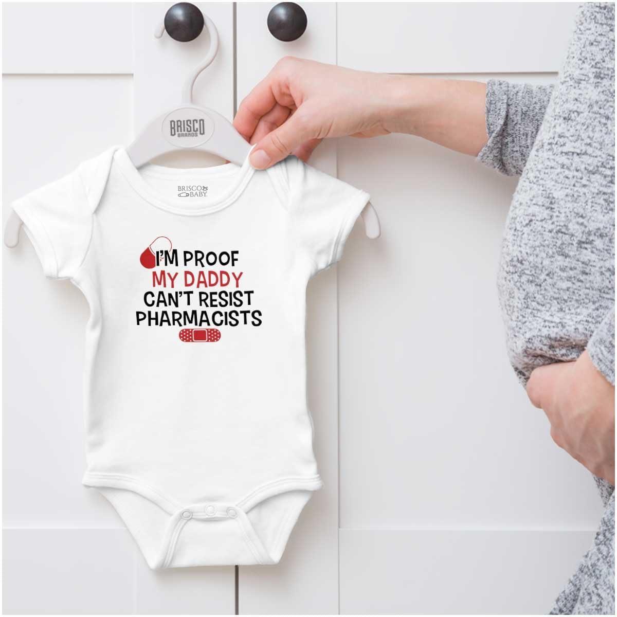 imageBrisco Brands Proof Daddy Cant Resist Pharmacists Baby Romper Boys or GirlsWhite