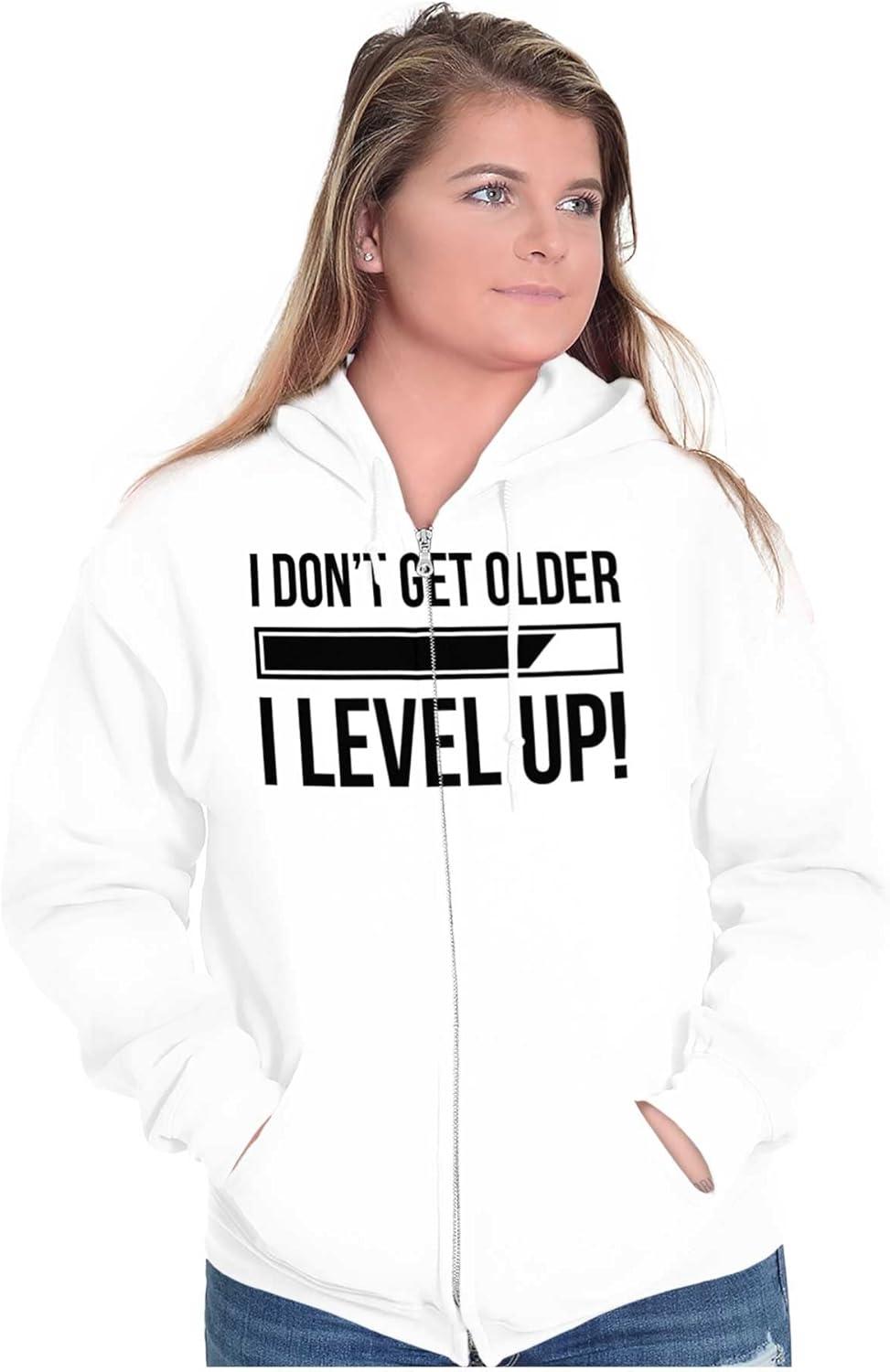 imageBrisco Brands I Dont Get Older I Level Up Gamer Zip Up Hoodie Mens WomensWhite