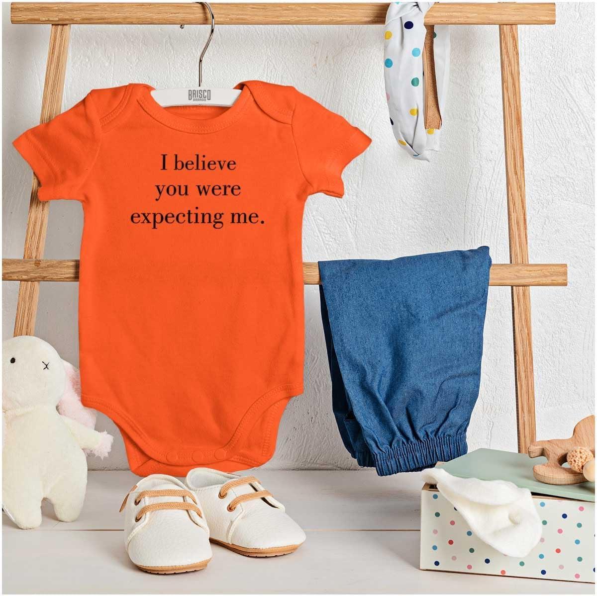 imageBrisco Brands I Believe You Were Expecting Me Baby Romper Boys or GirlsOrange