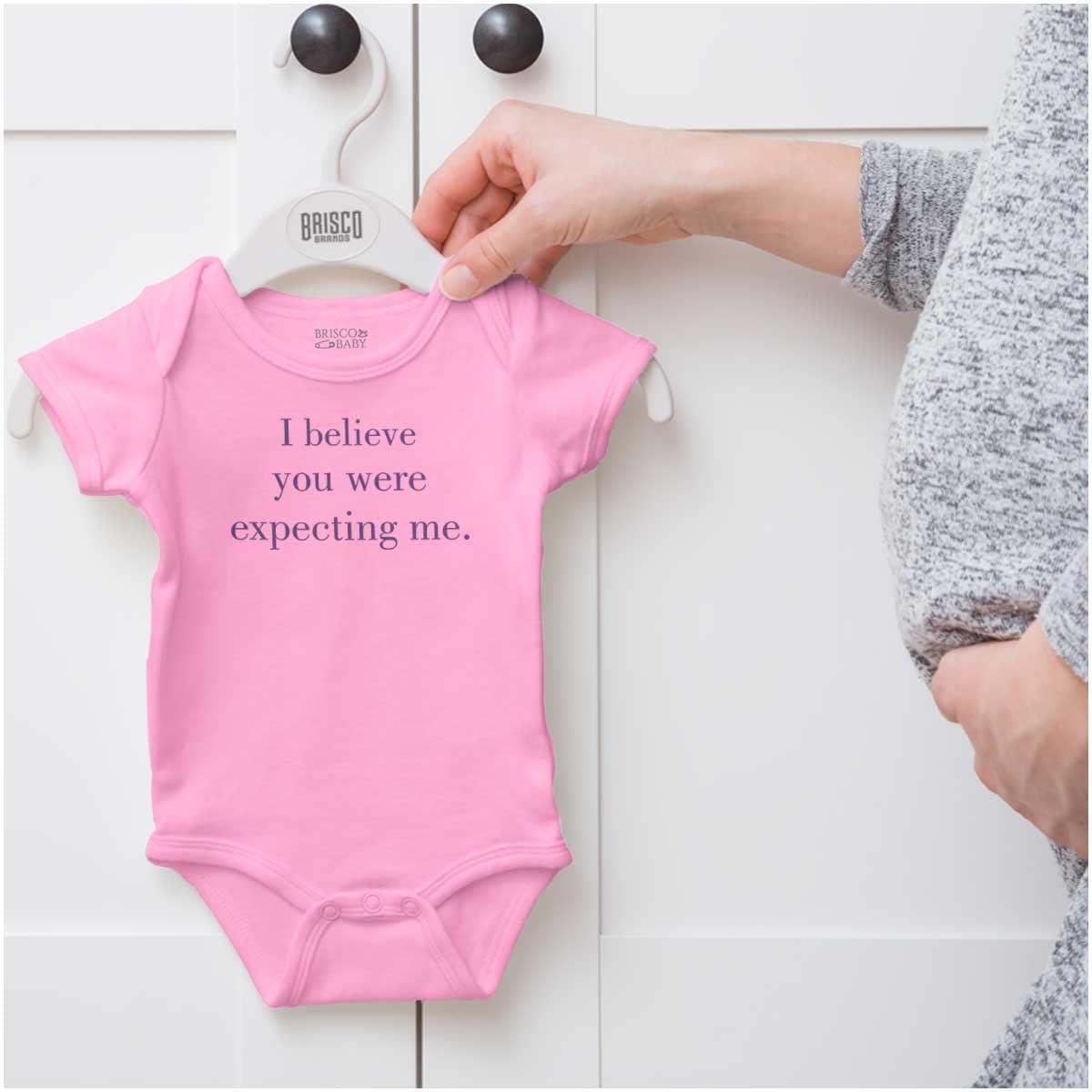 imageBrisco Brands I Believe You Were Expecting Me Baby Romper Boys or GirlsPink