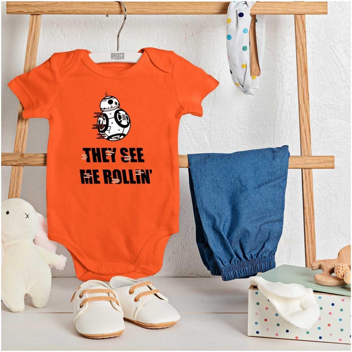 imageBrisco Brands They See Me Rollin Space Robot Galaxy Baby Romper Boys or GirlsOrange